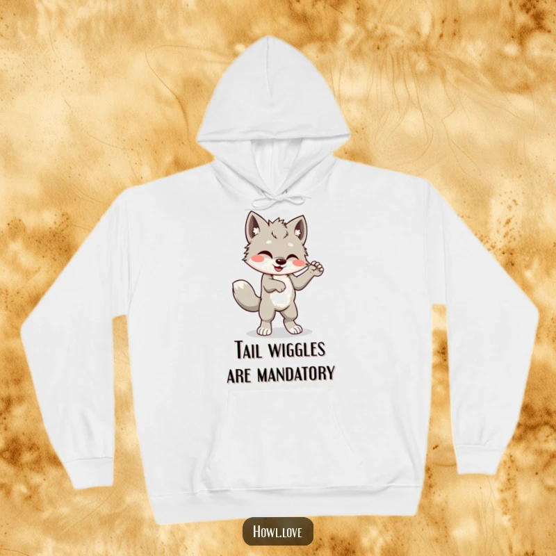 Funny hoodie depicting a joyful wolf cub cub performing a silly dance with its tail wagging furiously, full of life and humor.